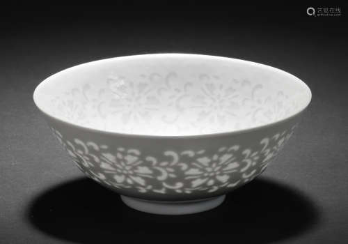 A very rare white glazed 'cut-through' 'lotus' bowl Qianlong seal mark and of the period