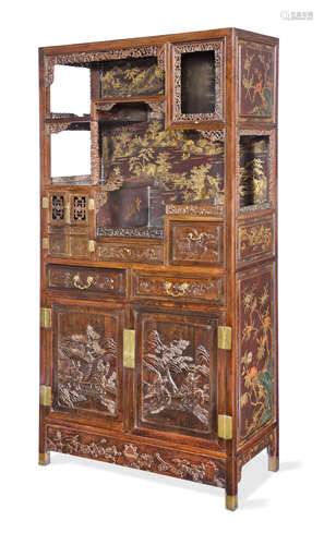 A magnificent gilt-lacquered zitan-veneered display cabinet Qing Dynasty