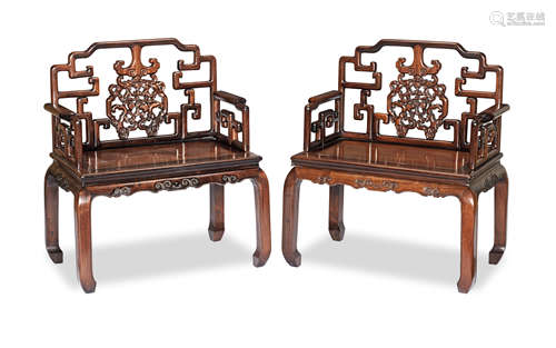 A pair of hongmu and huali armchairs 19th century