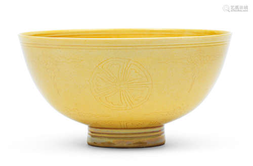 A rare yellow-glazed incised bowl Kangxi six-character mark and of the period