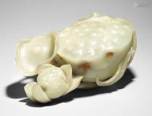 A large pale green and russet jade 'lotus' waterpot and cover 18th century