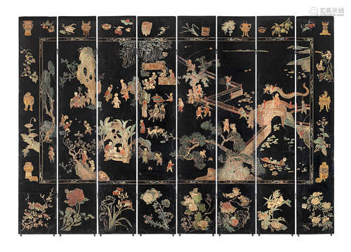 A rare eight-leaf double-sided 'coromandel' 'boys at play' lacquer screen Kangxi