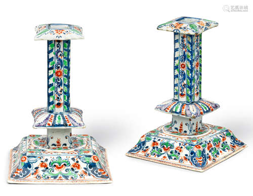 A pair of rare Delft-style famille verte silver-shaped candlesticks Kangxi