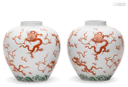 A pair of very rare iron-red and green-enamelled ovoid jars Yongzheng six-character marks and of the period