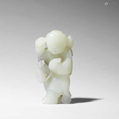 A fine white and grey jade carving of a boy on hobby-horse 17th/18th century