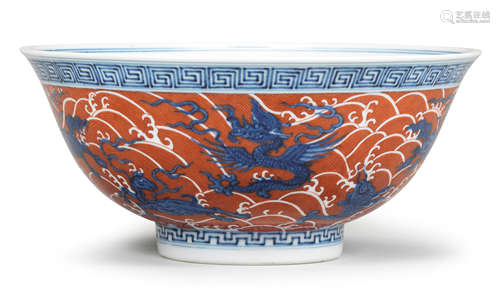 An iron-red and blue and white 'sea creatures' bowl Qianlong seal mark and of the period