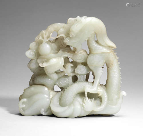 A pale green jade 'dragon and young' group Qianlong