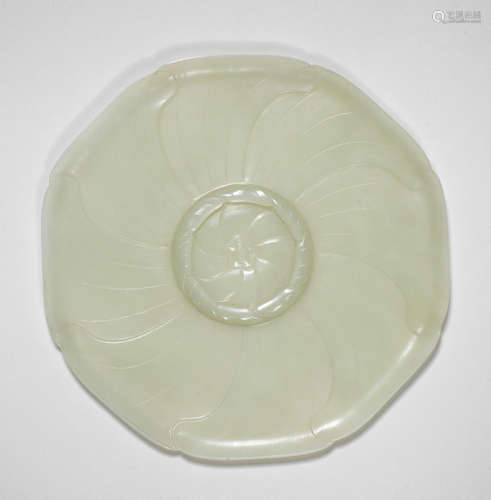 A very pale green jade floral shaped cup-stand Qianlong