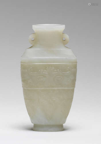 A pale green jade archaistic vase Qianlong