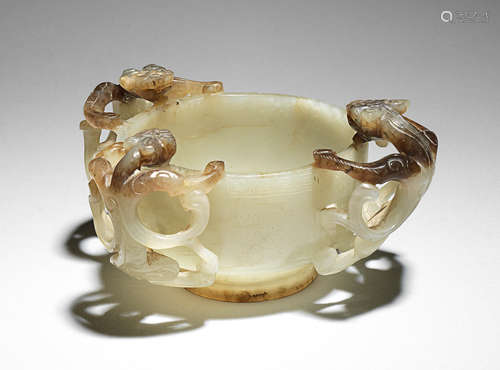 A fine pale green and grey jade 'chilong' cup Ming Dynasty