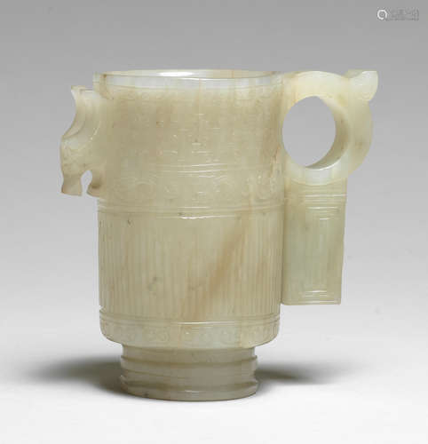 A pale green and russet jade cup Yuan/Ming Dynasty