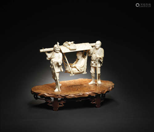 An ivory okimono group of figures Meiji era (1868-1912), late 19th/early 20th century