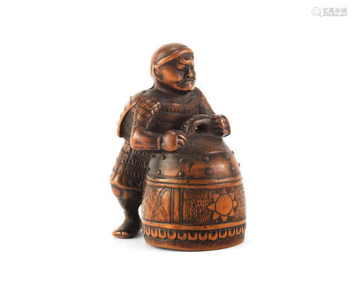 A Wood netsuke of Benkei and the bell of Miidera Edo period (1615-1868), early 19th century