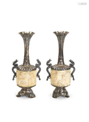 A pair of silver-mounted, enamelled, and carved ivory vases By Hayashi Chikayuki/Shuko and Tomomasa, Meiji era (1868-1912), late 19th/early 20th century