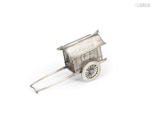 An unusual silvered-metal kodansu (cabinet) in the form of a gissha (ox-drawn carriage) Meiji era (1868-1912), late 19th/early 20th century