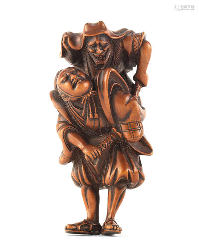 A wood netsuke of Omori Hikoshichi and Chihaya Edo period (1615-1868), late 18th/early 19th century