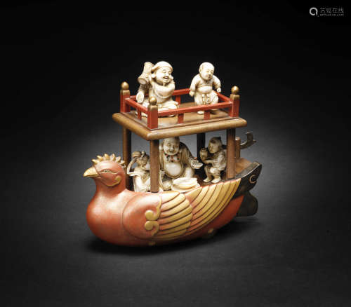 A gold-lacquer and ivory okimono of the takarabune (treasure ship) By Eishin, Meiji era (1868-1912), late 19th/early 20th century