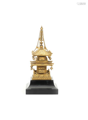 A finely-etched sentoku (brass alloy) cabinet modelled as a miniature nijunoto (two-storey pagoda) By Fujii Yoshitoyo (Biho, born 1868) of Kyoto, Meiji era (1868-1912), late 19th/early 20th century