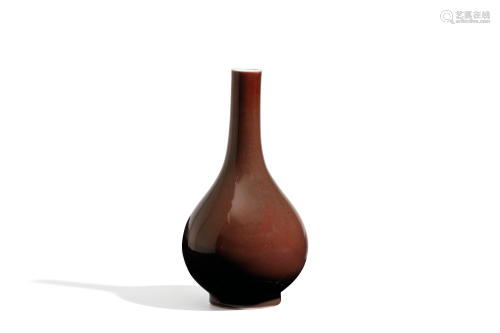 A SMALL COPPER-RED GLAZED PEAR-SHAPED BOTTLE…
