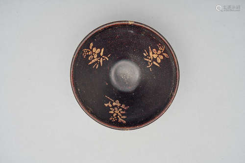 A jizhou black-glazed paper-cut resist-decorated 'prunus spray' tea bowl  12th/ 13th century