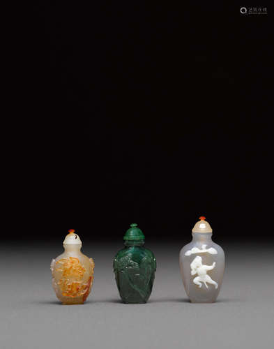 Three snuff bottles fitted in a mother-of-pearl inlaid lacquer box  The bottles; 20th century