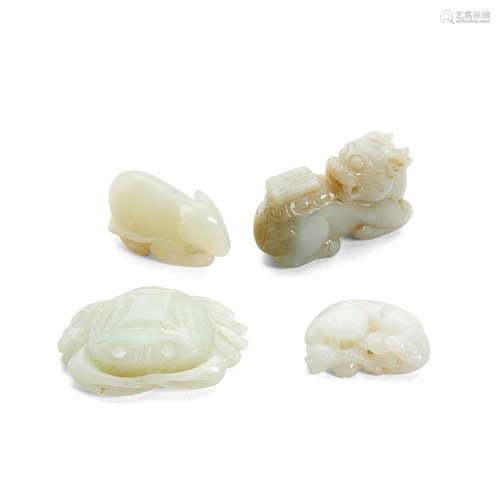 A group of four small jade animal models