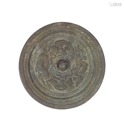 A cast bronze mirror  Qing dynasty or earlier