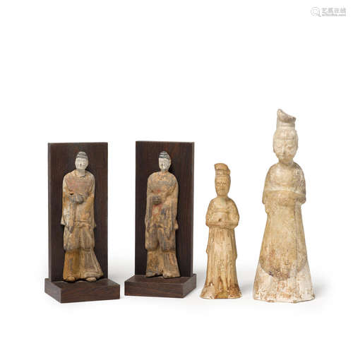 A group of four standing pottery figures  Northern Wei, Sui and Tang periods