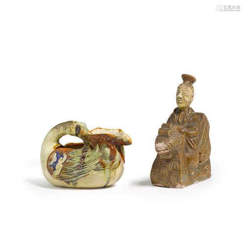 Two glazed pottery figural decorations