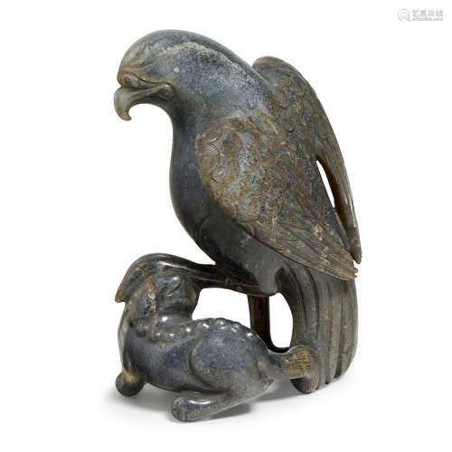 A CARVED dark GRAY JADE GROUP OF AN EAGLE AND A BEAR