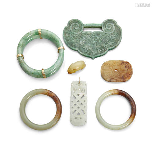 A group of seven jade and hardstone decorations