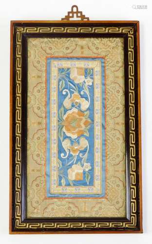 An early 20thC Chinese silk work, of rectangular form set with various flowers and insects, with a