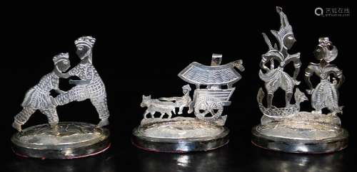 Three Indian menu card holders, set with Eastern figures, partially pierced, to include horse