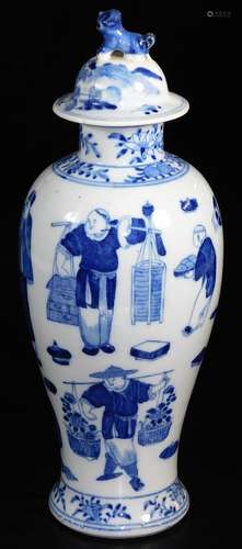 A slender Chinese porcelain baluster vase and cover, with dog of fo finial, the body painted in