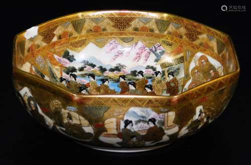 A Japanese Satsuma earthenware hexagonal bowl, decorated in colours and heavy gilt with shaped