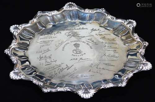 A ceremonial Indian salver, with a pie crust and heart shaped part gadrooned border, with various