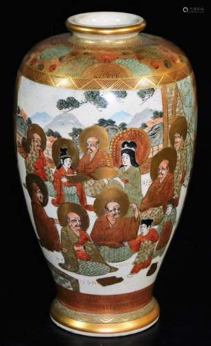 A Japanese Satsuma baluster vase, decorated with haloed deities in a mountainous landscape,