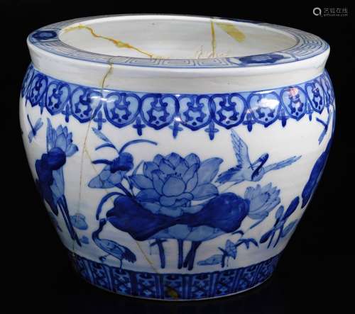 A 20thC Chinese porcelain jardiniere, profusely decorated with insects, flowering shrubs, etc., with