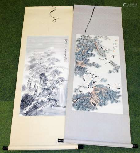 A Chinese picture scroll. Exotic birds amongst trees, wash, on paper on a material ground, signed
