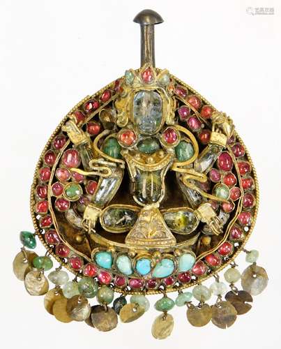 An early 20thC Indian jewel, centred by Lakshmi and set with turquoise, green and pink stones, on