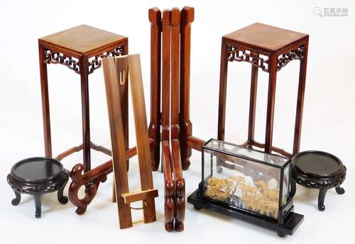 An export style Chinese wooden stand, of square form with a pierced apron on square shaped legs,