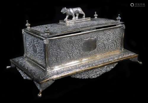 An early 20thC Indian ceremonial freedom casket, of rectangular form, with tiger knop, heavily