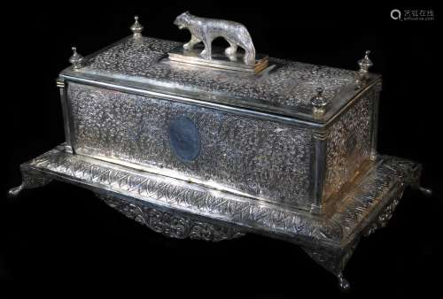 An early 20thC Indian ceremonial freedom casket, of rectangular form with tiger knop, profusely