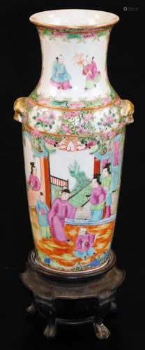 A Cantonese famille rose baluster vase, decorated with panels of court figures surrounded by flowers