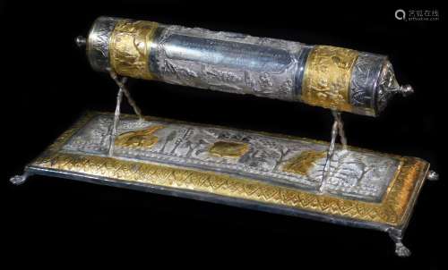 An early 20thC Indian ceremonial freedom casket, of cylindrical form on a stand, heavily repousse