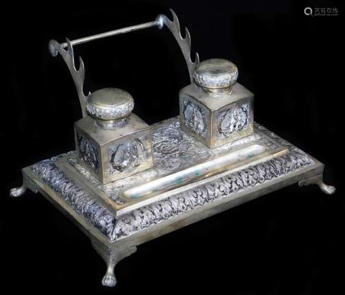An early 20thC Indian ceremonial ink stand, of rectangular form, with space for pens and with two