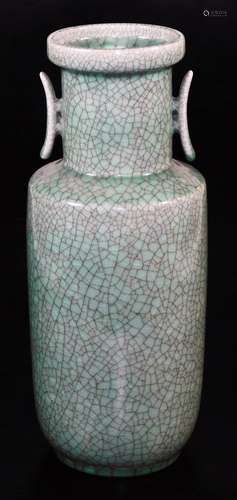 A late 20thC Chinese celadon vase, with cylindrical stem, shouldered body and shaped handles on