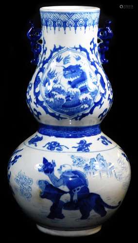 A late 20thC Chinese porcelain double gourd vase, decorated in underglaze blue with figures and