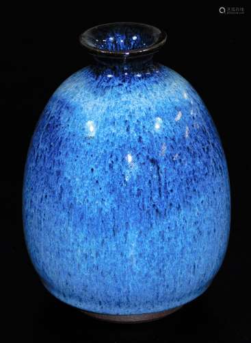 A 20thC glazed egg shell pottery vase, of tapering form, unmarked, 14cm high.