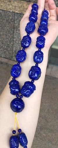 A LAZULI CARVED ARHAT PATTERN BRACELET